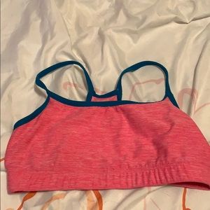 Pink and blue girls sports bra